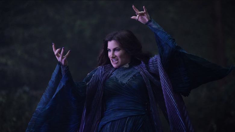 Kathryn Hahn as Agatha Harkness casting a magic spell in the woods