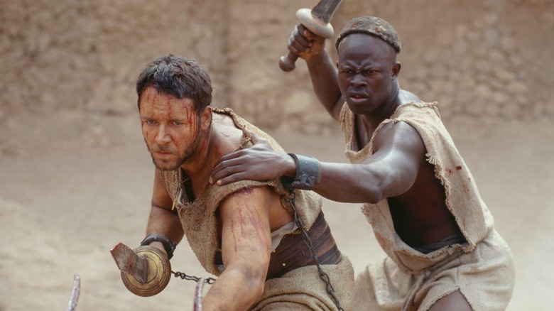 Russell Crowe and Djimon Hounsou in Gladiator