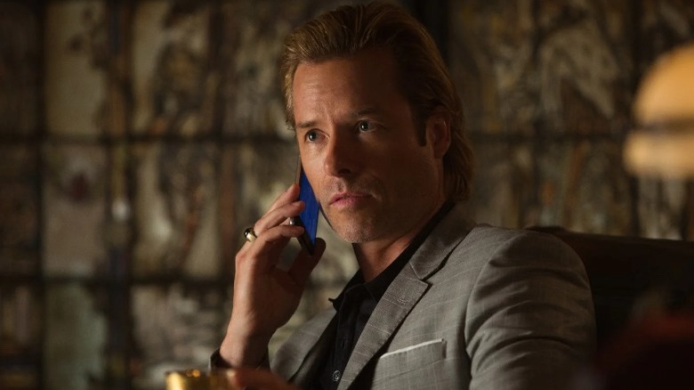 Aldrich Killian on the phone