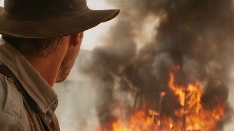 Raiders of the Lost Ark indy looks at exploded truck