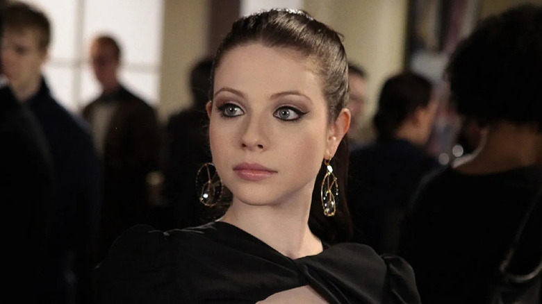 Georgina with cat-eye liner and her hair pulled back on Gossip Girl