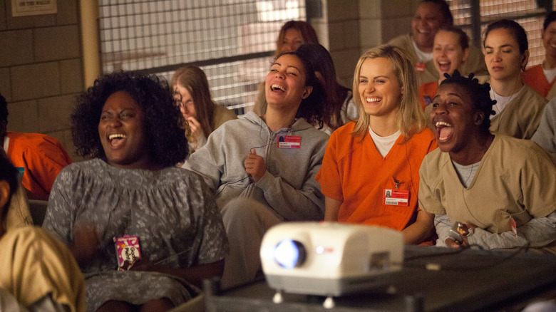 Some of the cast of Orange is the New Black watching a movie