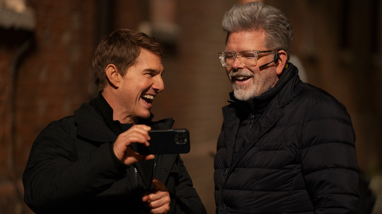 Tom Cruise and Christopher McQuarrie laugh