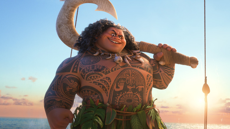 Maui standing proud and holding his hook in Moana 2