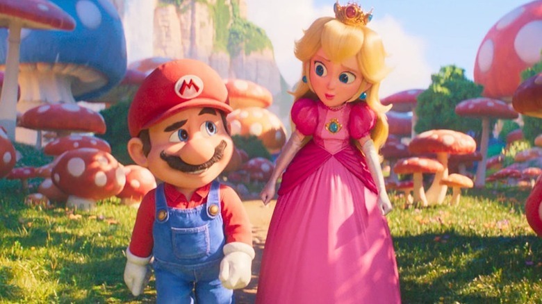 Mario looks skeptical at Peach who stares down at him in The Super Mario Bros. Movie