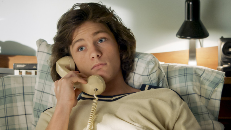 Montana Jordan as Georgie Cooper, who is on the phone in bed in the episode 