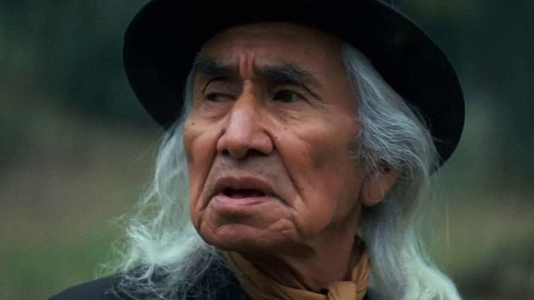 A close-up shot of Chief Dan George looking off to the side in The Outlaw Josey Wales