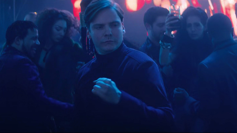 Daniel Brühl with raised fist