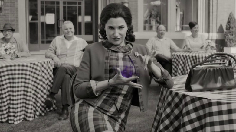 Kathryn Hahn in black and white wearing mid-century clothing