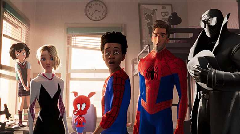 All the Spider-Mans standing in Miles' bedroom