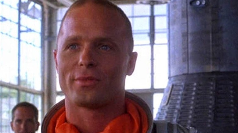 Ed Harris smiles as Chuck Yeager