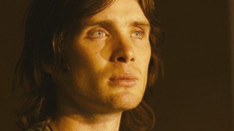 Cillian Murphy quietly beholds space.