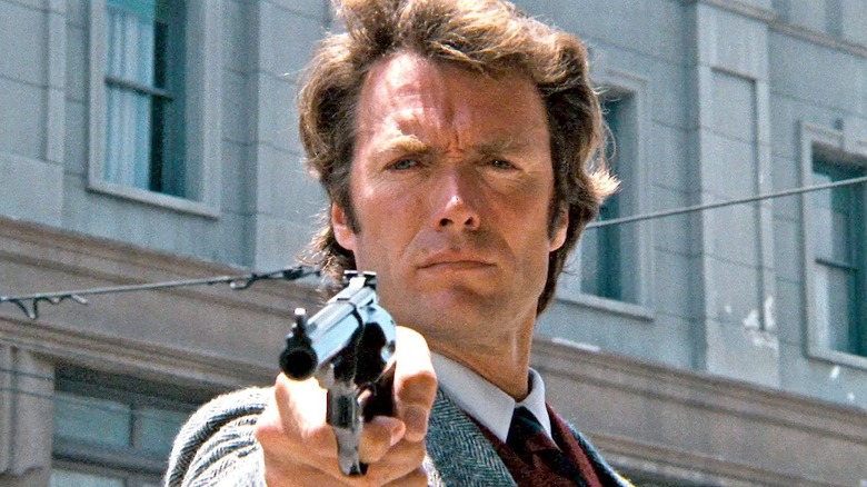 Clint Eastwood points gun