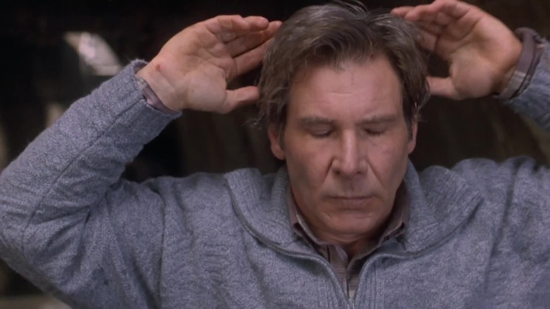 Harrison Ford closing eyes