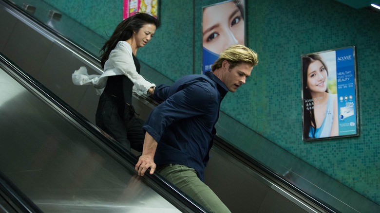 Chris Hemsworth runs down escalator in Blackhat