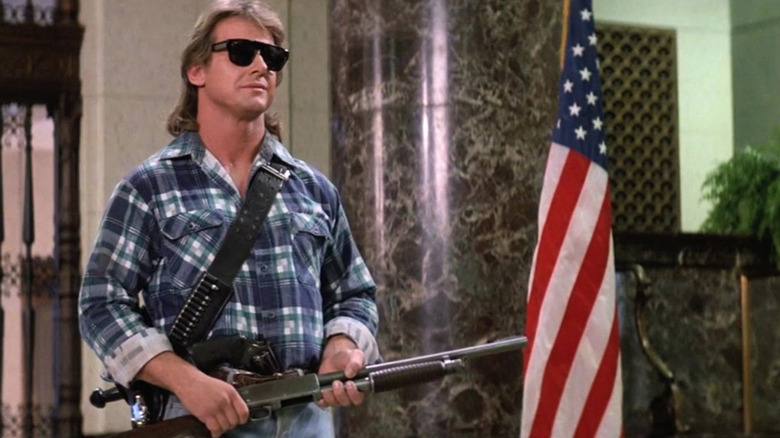 Roddy Piper with shot gun