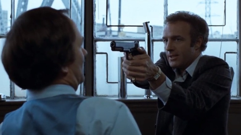 James Caan holds a gun on a foe in "Thief"
