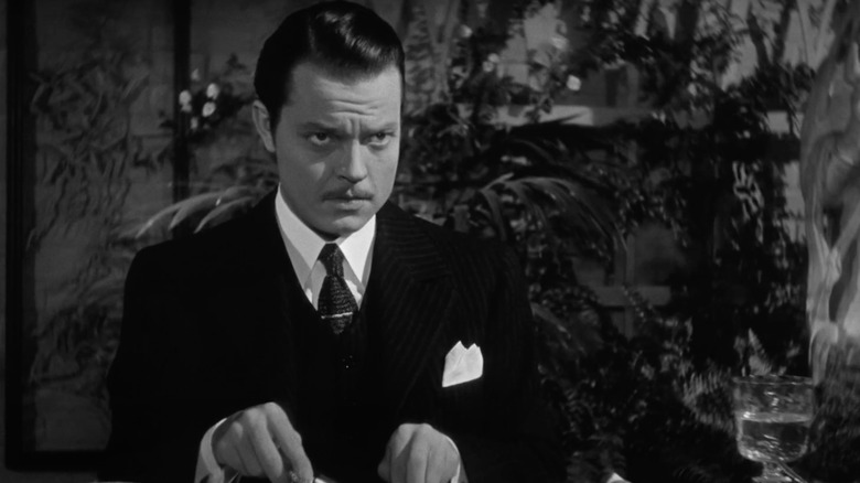 Orson Welles as Charles Foster Kane eats some food in Citizen Kane