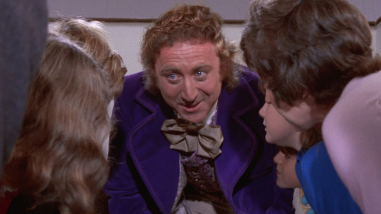 Gene Wilder as Willy Wonka talks to a group of kids in Willy Wonka & the Chocolate Factory