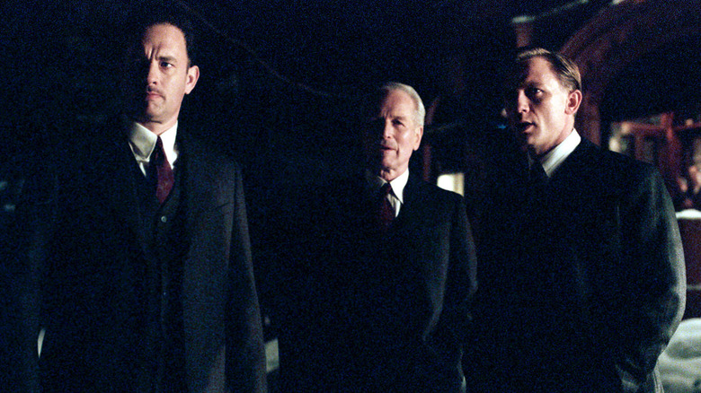 Tom Hanks, Paul Newman, and Daniel Craig in Road to Perdition