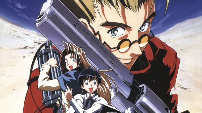 Trigun poster Vash The Stampede large in background with Meryl and Milly in foreground