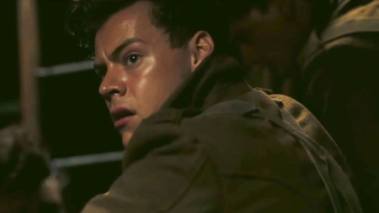 harry styles looking over his shoulder in the movie dunkirk