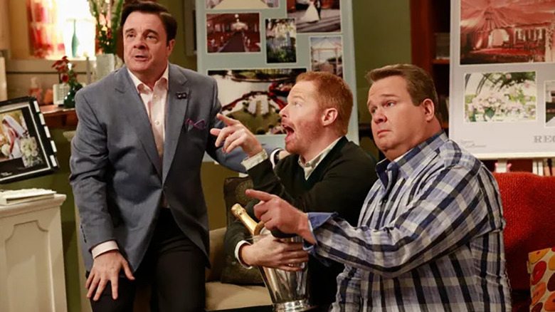 nathan lane starting next to jesse tyler ferguson and eric stonestreet on the tv show modern family 