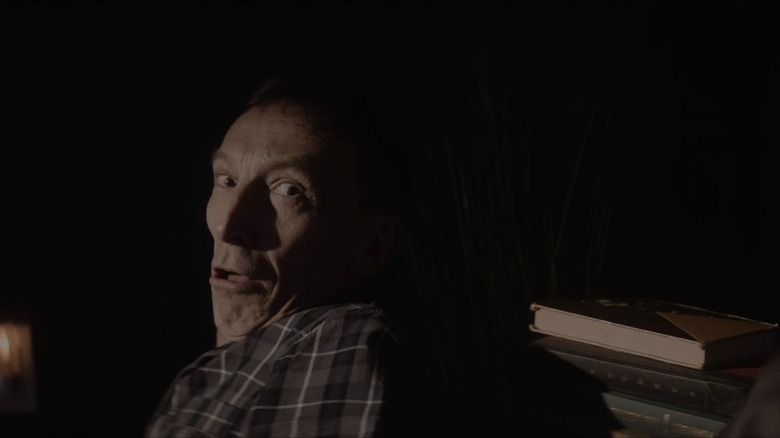 Julian Richings looking over his shoulder in horror in Anything for Jackson