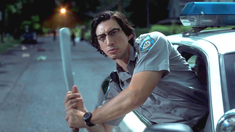 Adam Driver's Ronnie Peterson wielding a baseball bat in The Dead Don't Die