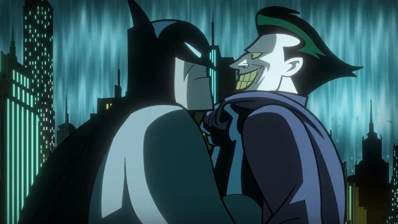 Batman agarra Joker pelo colarinho em crise em Infinite Earths Part 3