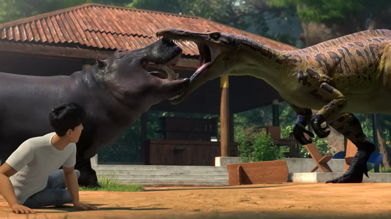 Kenji observa um hipopótamo lutar contra um Suchomimus em Jurassic World: Chaos Theory