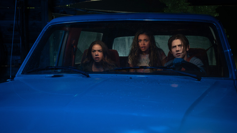 A group of teenagers looked scared in a car in Time Cut