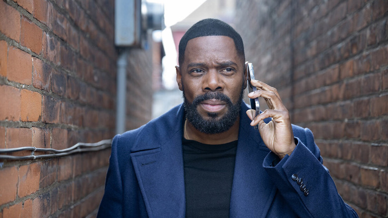 Colman Domingo as Muncie Daniels chats on a smartphone in The Madness