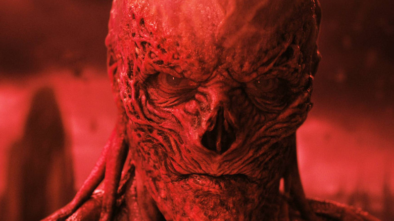 Vecna bathed in red light in Stranger Things