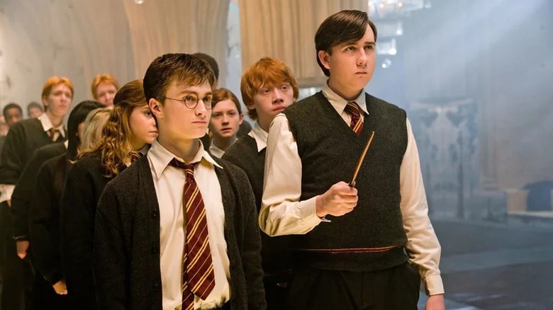 Harry and Nevill are practicing spells with Dumbledore's army in Harry Potter and Phoenix Order