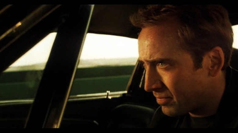 Cage in the driver's seat doing his own stunts for Gone in 60 Seconds