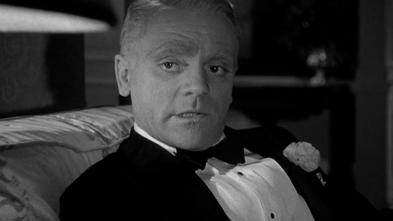 Cagney wearing suit