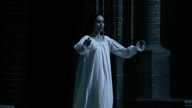 Ellen embraces the darkness in Nosferatu