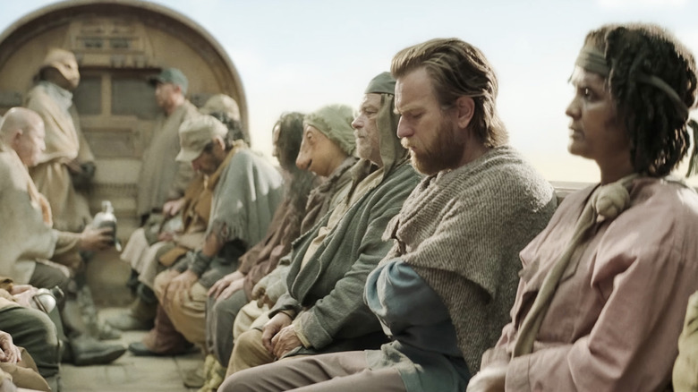 Obi-Wan Kenobi cast on a travel vehicle