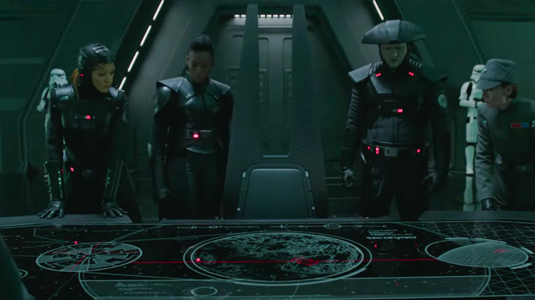 The Inquisitors study a map in Obi-Wan Kenobi