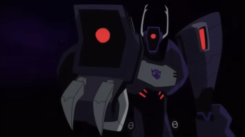 Shockwave pointing his cannon in Transformers: Animated