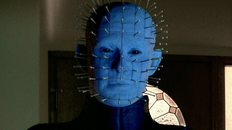 Pinhead standing in a room in Hellraiser: Inferno