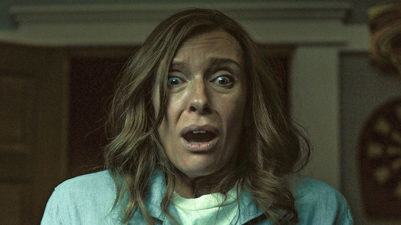 Toni Collette as Annie, reacting to something horrifying in Hereditary