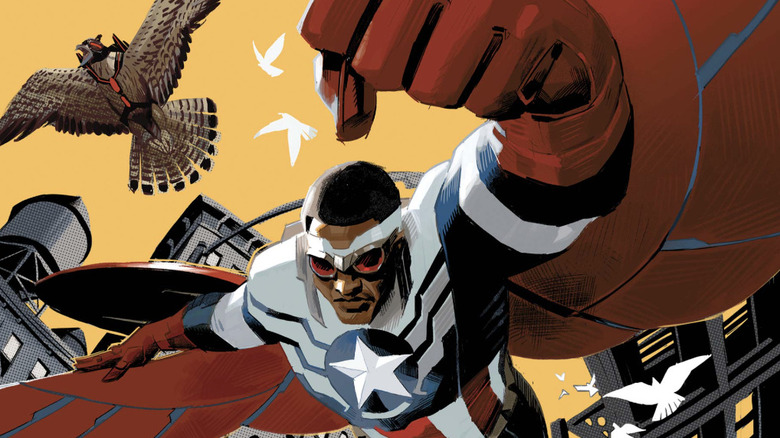 Art by Daniel Acuna showing Sam Wilson, as Captain America, and Redwing flying through New York City