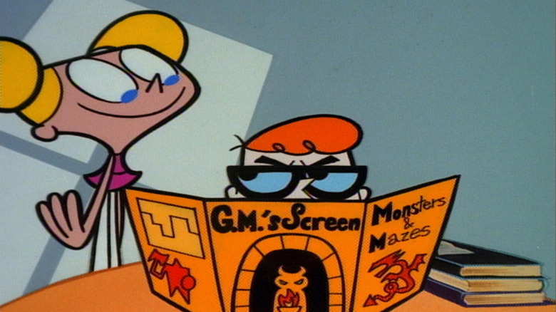 Dexter reading Monsters & Mazes guide as Dee Dee watches