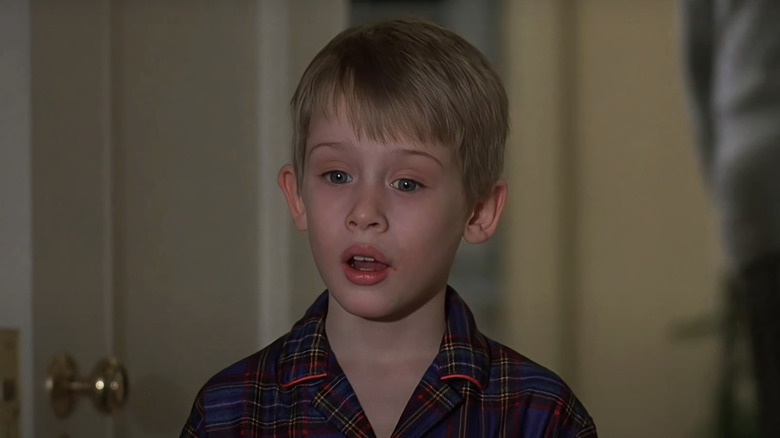 Macaulay Culkin's Miles Russell looks shocked while wearing pajamas in Uncle Buck