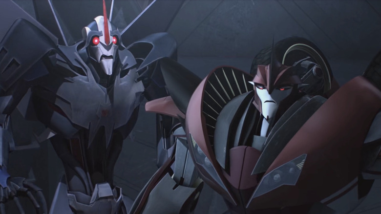 Transformers: Prime Starscream looking scared Knock Out looking annoyed