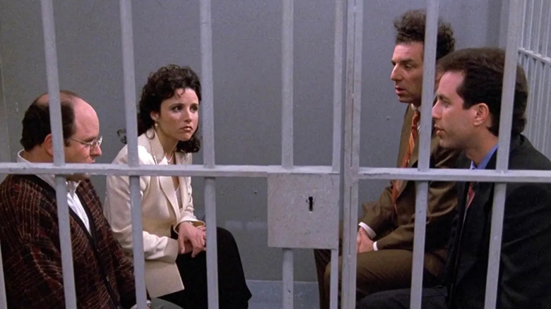 Seinfeld, George, Elaine, Kramer, and Jerry in a jail cell