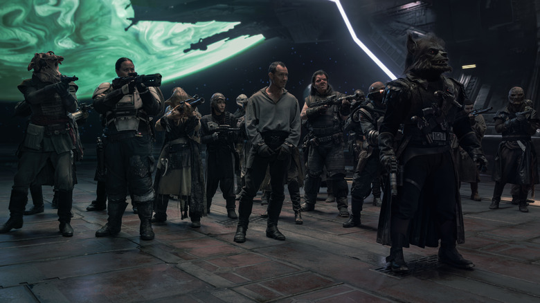 Jodh Na Naud is handcuffed and surrounded by his old pirate crew in Star Wars: Skeleton Crew