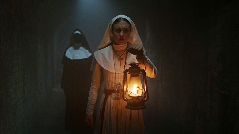 Sister Irene senses an evil presence behind her in The Nun